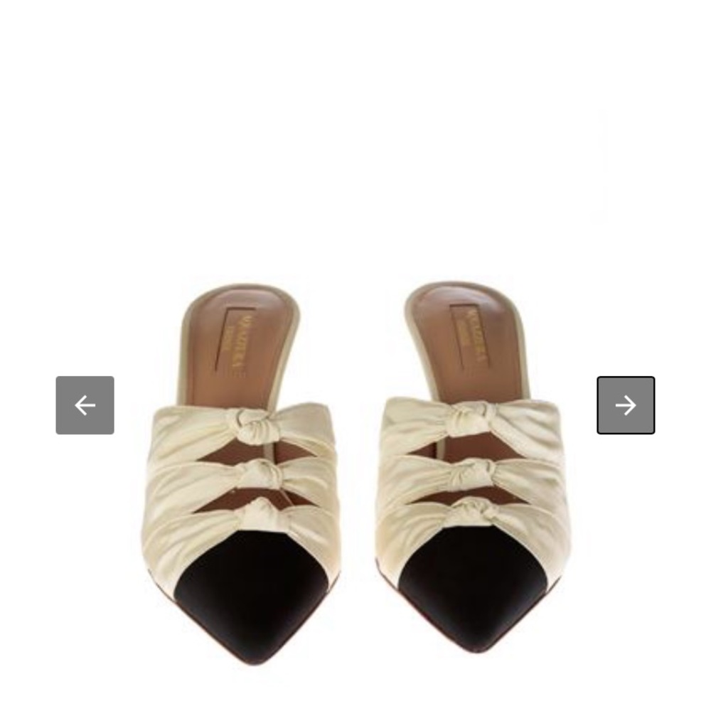 NEVER WORN : AQUAZZURA
Mondaine 75 mules in beige